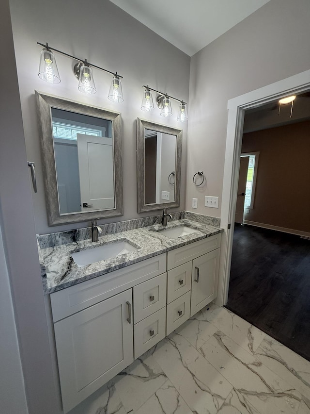 1526 2nd St, Waynesboro, VA 22980 - full bathroom featuring double vanity and marble look tiles
