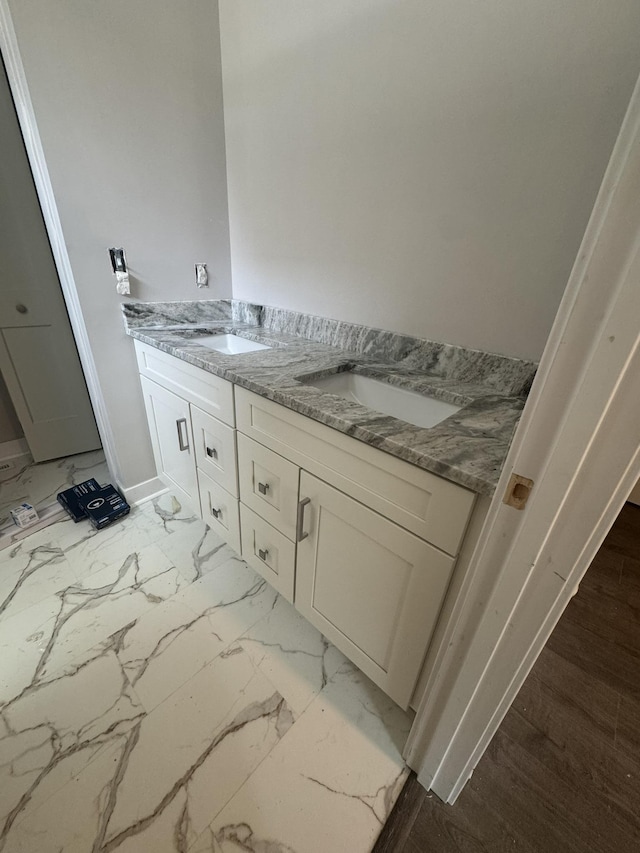 1526 2nd St, Waynesboro, VA 22980 - full bathroom featuring double vanity, marble finish flooring, and baseboards