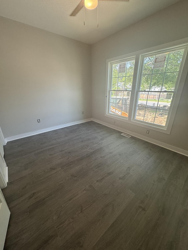 1526 2nd St, Waynesboro, VA 22980 - unfurnished room with ceiling fan, dark wood-style floors, and baseboards