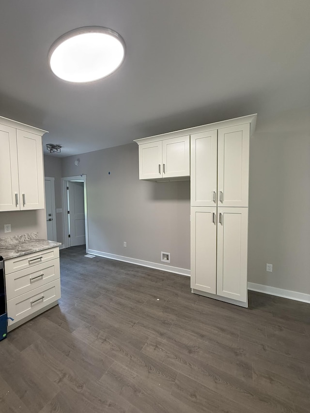 1526 2nd St, Waynesboro, VA 22980 - kitchen with white cabinetry and dark wood finished floors