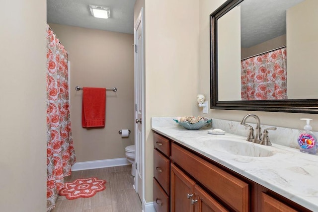117 Villa View Dr, Staunton, VA 24401 - full bath featuring toilet, baseboards, wood finished floors, and vanity