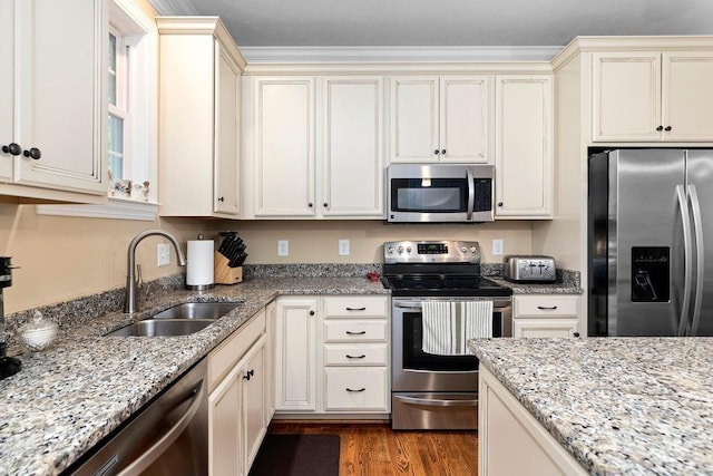 117 Villa View Dr, Staunton, VA 24401 - kitchen with appliances with stainless steel finishes, a sink, wood finished floors, and light stone counters