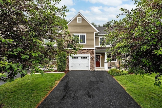 117 Villa View Dr, Staunton, VA 24401 - view of front of home with stone siding, a garage, a front yard, and asphalt driveway