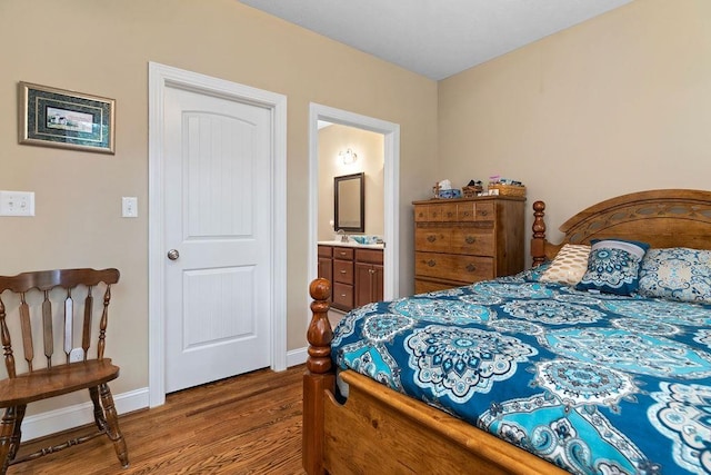 117 Villa View Dr, Staunton, VA 24401 - bedroom with wood finished floors, baseboards, and connected bathroom