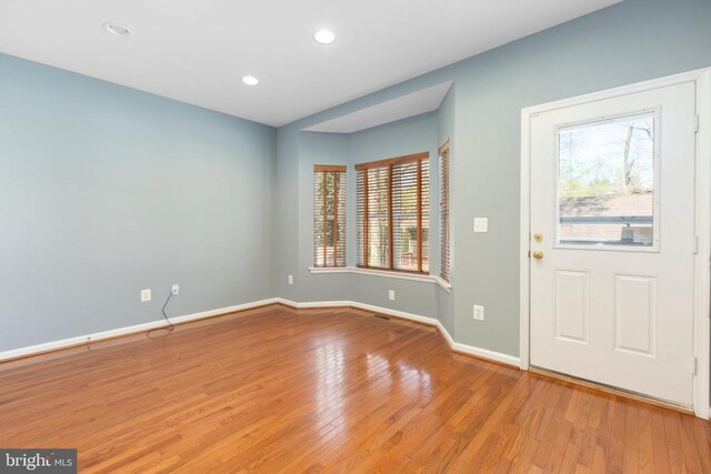 108 Monroe St, Locust Grove, VA 22508 - foyer featuring plenty of natural light, baseboards, wood finished floors, and recessed lighting