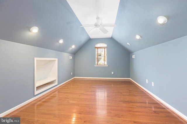 108 Monroe St, Locust Grove, VA 22508 - additional living space with lofted ceiling, wood finished floors, ceiling fan, and baseboards