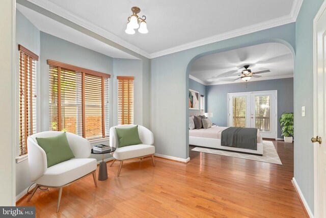 108 Monroe St, Locust Grove, VA 22508 - bedroom with arched walkways, light wood-style floors, baseboards, and crown molding