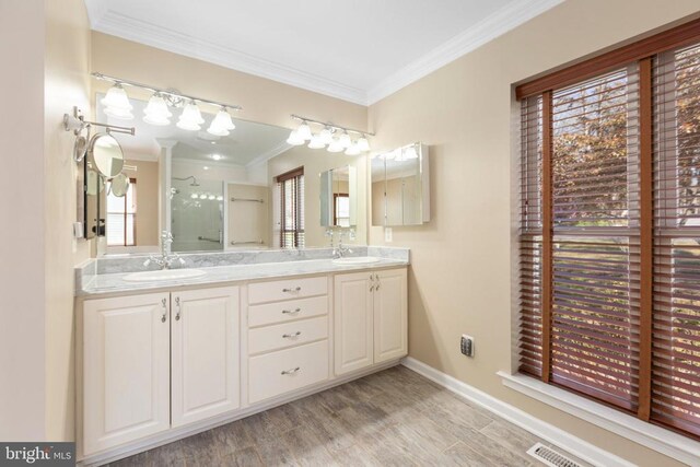 108 Monroe St, Locust Grove, VA 22508 - bathroom featuring a stall shower, crown molding, double vanity, wood finished floors, and baseboards