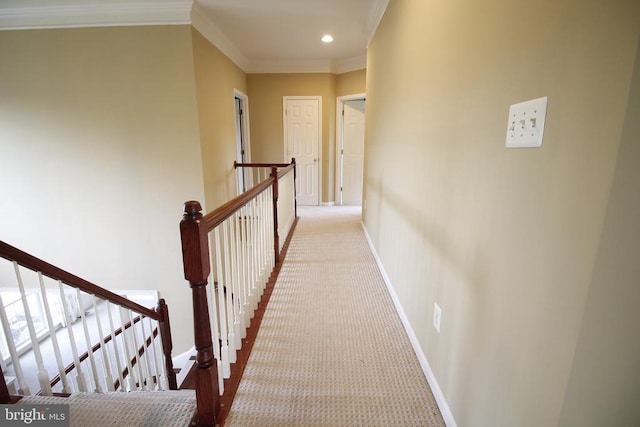  - corridor featuring an upstairs landing, carpet flooring, crown molding, and recessed lighting