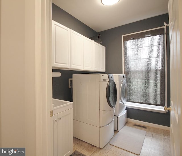  - laundry room with independent washer and dryer and cabinet space