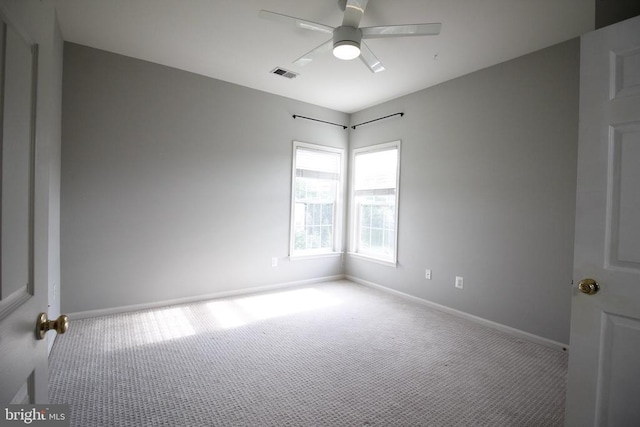  - spare room with carpet and ceiling fan