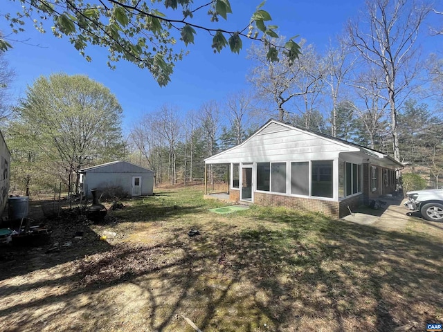 3133 Burnley Station Rd, Barboursville, VA 22923 - back of house with brick siding and a sunroom