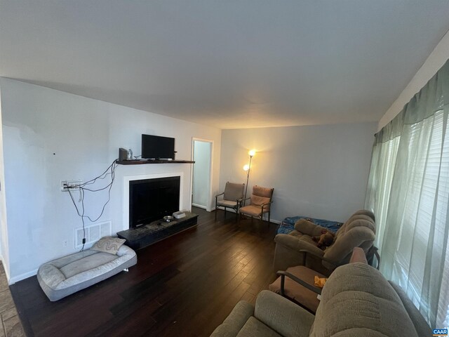 3133 Burnley Station Rd, Barboursville, VA 22923 - living area featuring hardwood / wood-style flooring and a fireplace with raised hearth