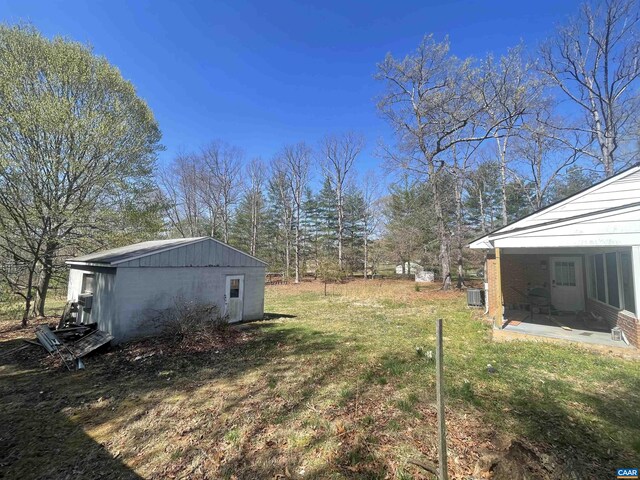 3133 Burnley Station Rd, Barboursville, VA 22923 - view of grassy yard with central air condition unit and a patio area