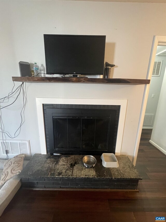 3133 Burnley Station Rd, Barboursville, VA 22923 - detailed view of a fireplace with raised hearth and wood finished floors