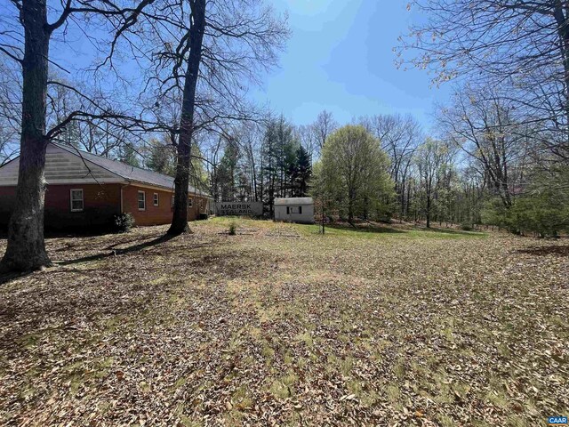 3133 Burnley Station Rd, Barboursville, VA 22923 - view of yard with an outbuilding and a storage unit