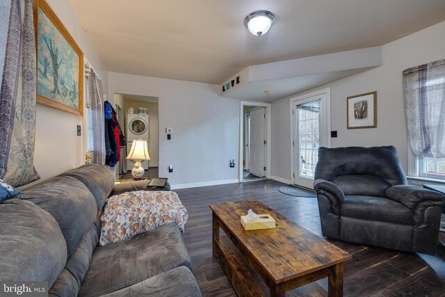 115 Page St E, Luray, VA 22835 - living room featuring estacked washer and dryer and dark wood-type flooring