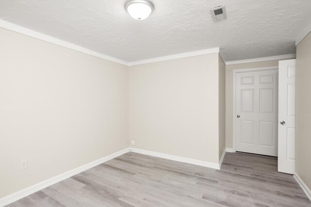 2890 Crystal Spring Ln, Rockingham, VA 22801 - unfurnished room featuring wood finished floors, baseboards, ornamental molding, and a textured ceiling
