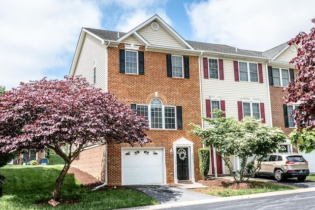 2890 Crystal Spring Ln, Rockingham, VA 22801 - view of front of home with an attached garage, brick siding, and asphalt driveway