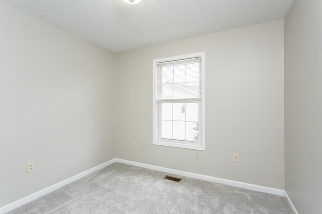 2890 Crystal Spring Ln, Rockingham, VA 22801 - empty room featuring light carpet and baseboards