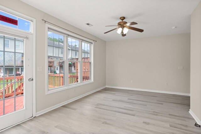 2890 Crystal Spring Ln, Rockingham, VA 22801 - empty room featuring a ceiling fan, light wood-style flooring, and baseboards