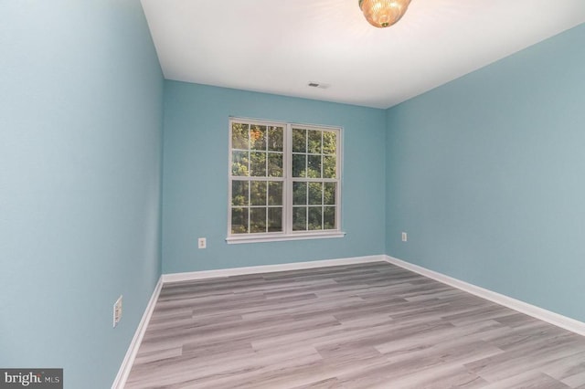 6224 Hot Spring Ln, Fredericksburg, VA 22407 - spare room featuring baseboards and wood finished floors