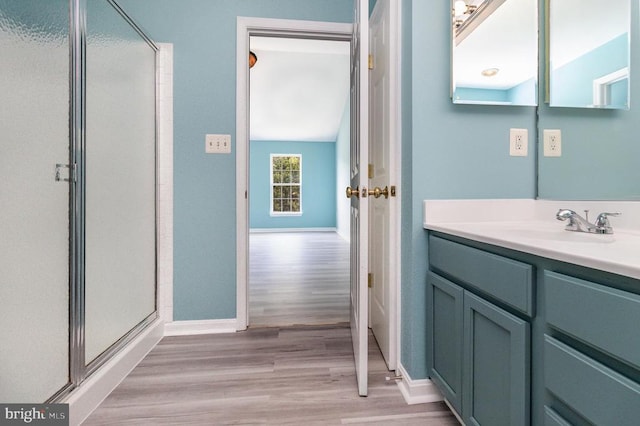 6224 Hot Spring Ln, Fredericksburg, VA 22407 - full bath with a stall shower, wood finished floors, and vanity