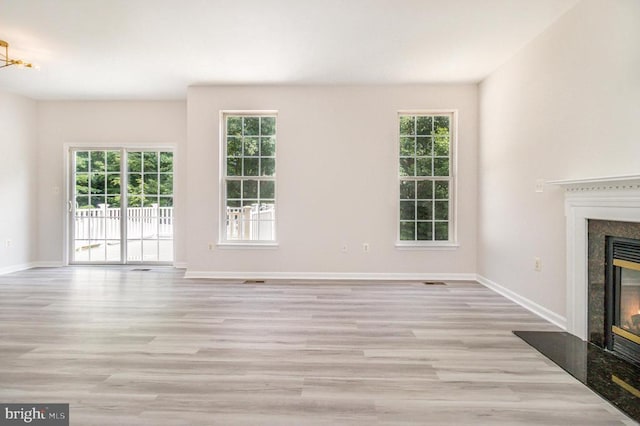 6224 Hot Spring Ln, Fredericksburg, VA 22407 - unfurnished living room with a premium fireplace and wood finished floors