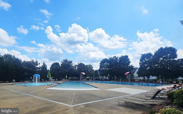6224 Hot Spring Ln, Fredericksburg, VA 22407 - community pool with a patio area