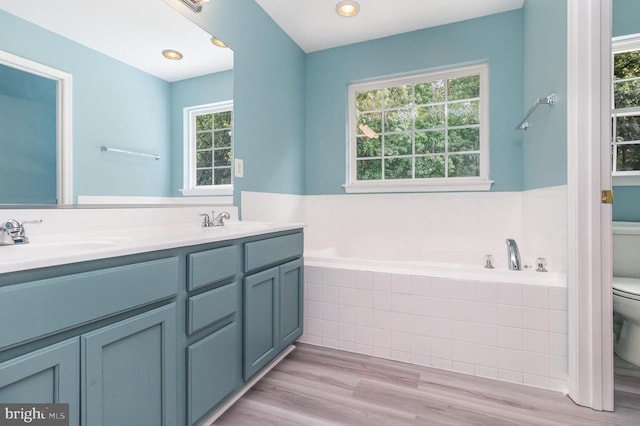 6224 Hot Spring Ln, Fredericksburg, VA 22407 - full bath with a bath, plenty of natural light, double vanity, and wood finished floors
