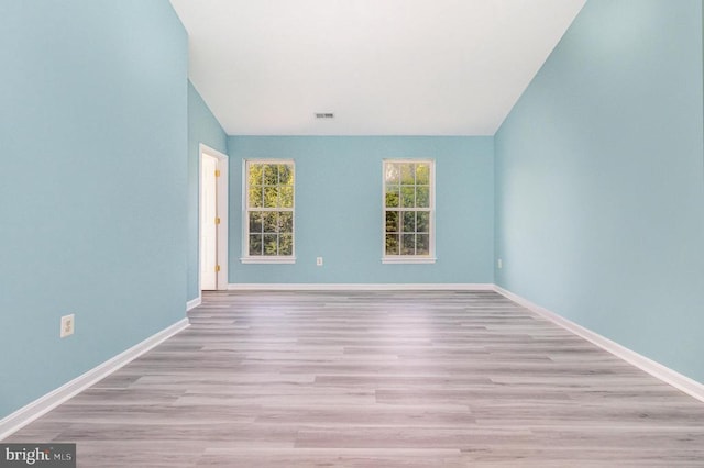 6224 Hot Spring Ln, Fredericksburg, VA 22407 - empty room with wood finished floors and lofted ceiling