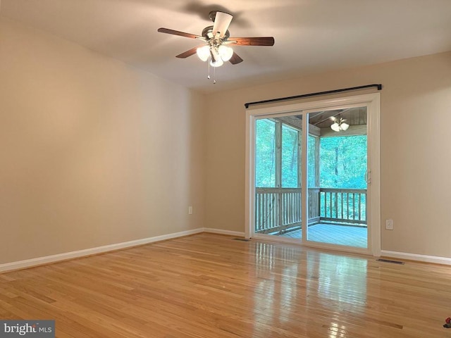 273 Pettit Pl, Louisa, VA 23093 - unfurnished room with baseboards, a ceiling fan, and light wood-type flooring