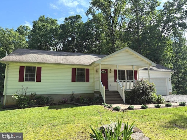 273 Pettit Pl, Louisa, VA 23093 - single story home featuring a porch, an attached garage, and a front lawn