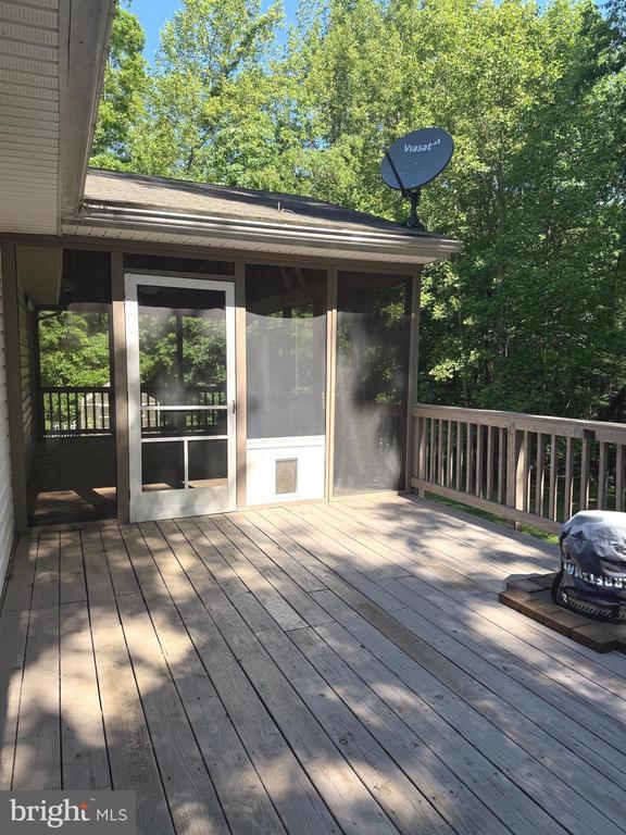 273 Pettit Pl, Louisa, VA 23093 - wooden terrace featuring a sunroom