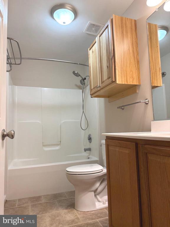 273 Pettit Pl, Louisa, VA 23093 - full bathroom with vanity, bathing tub / shower combination, and toilet