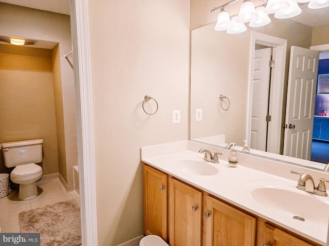  - bathroom featuring double vanity, tile patterned floors, and shower / washtub combination