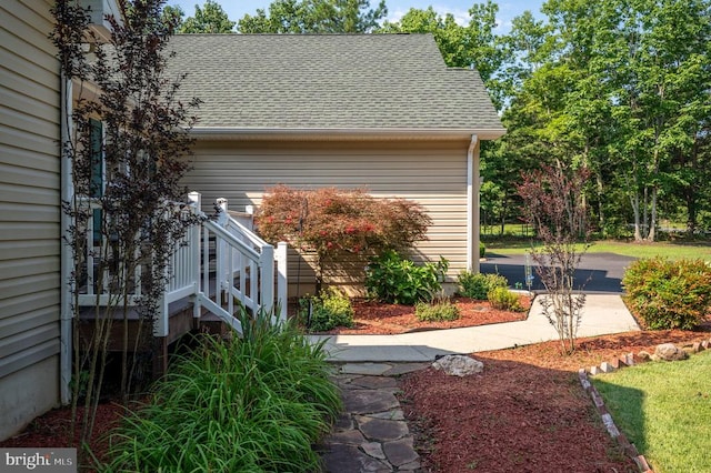 108 Shannon Glen Ct, Louisa, VA 23093 - view of property exterior featuring roof with shingles