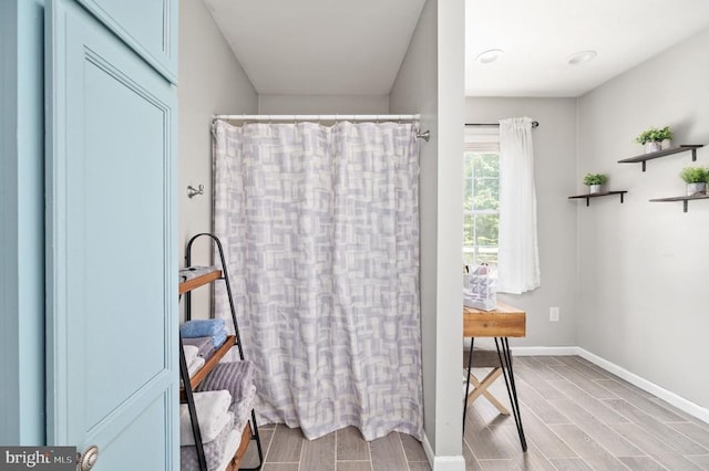 108 Shannon Glen Ct, Louisa, VA 23093 - full bath featuring wood finish floors and curtained shower