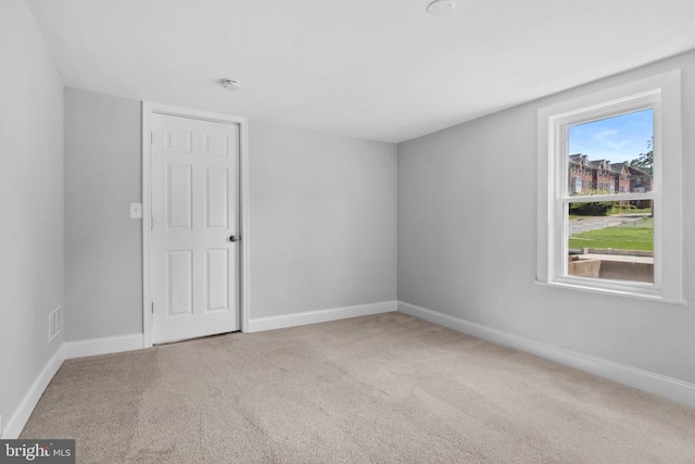 63 Madison St, Warrenton, VA 20186 - carpeted empty room featuring baseboards and a smoke detector