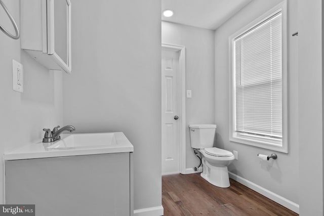 63 Madison St, Warrenton, VA 20186 - half bathroom with wood finished floors and vanity