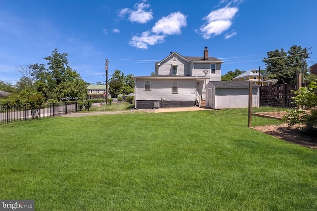 63 Madison St, Warrenton, VA 20186 - back of house featuring a storage unit, a chimney, and a fenced backyard