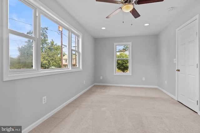 63 Madison St, Warrenton, VA 20186 - empty room with healthy amount of natural light, a smoke detector, light colored carpet, ceiling fan, and recessed lighting