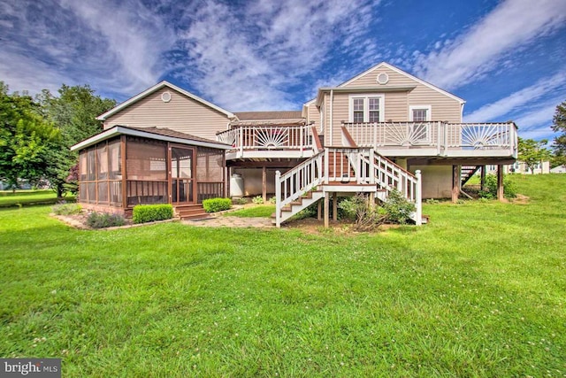 703 10th St, Shenandoah, VA 22849 - rear view of property featuring a sunroom, stairs, a deck, and a lawn