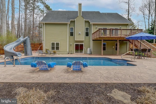11304 Piney Forest Dr, Bumpass, VA 23024 - outdoor pool with stairs, a deck, a water slide, and a patio