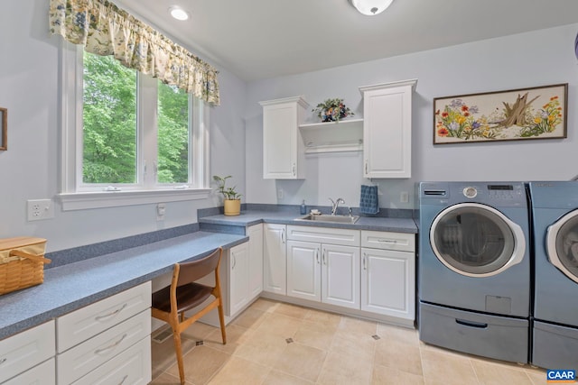 143 Chapel Ct, Palmyra, VA 22963 - clothes washing area featuring separate washer and dryer, plenty of natural light, cabinet space, and light tile patterned floors