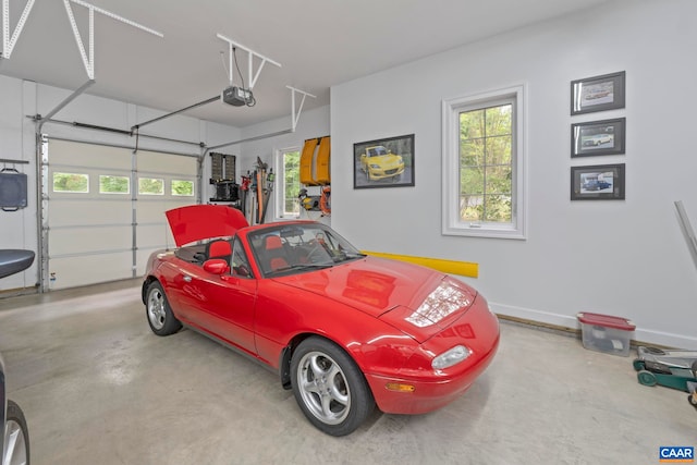 143 Chapel Ct, Palmyra, VA 22963 - garage featuring a garage door opener