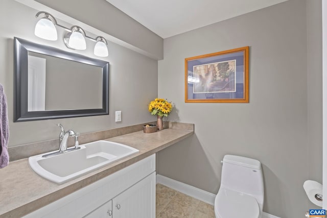 143 Chapel Ct, Palmyra, VA 22963 - bathroom featuring baseboards, vanity, toilet, and tile patterned floors
