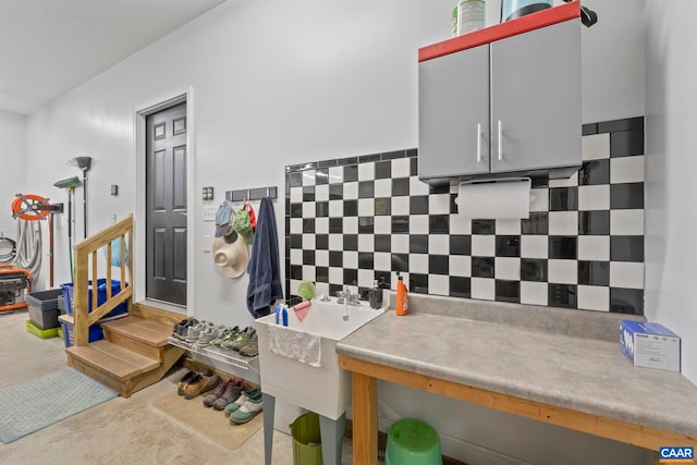 143 Chapel Ct, Palmyra, VA 22963 - kitchen with tasteful backsplash and concrete flooring