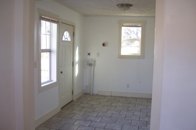 17156 Red Brush Rd, Elkton, VA 22827 - entryway featuring a textured ceiling and baseboards