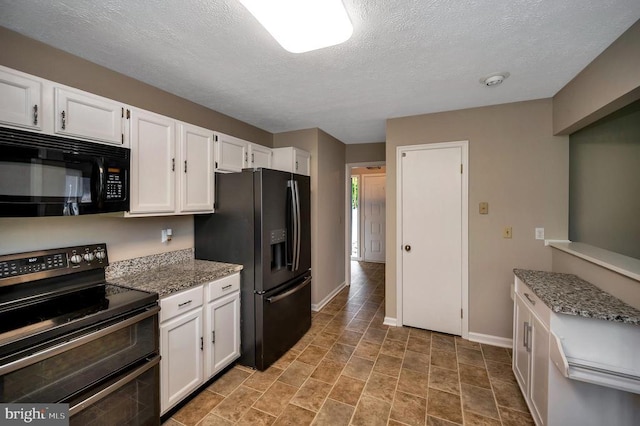 141 Eagle Ct, Locust Grove, VA 22508 - kitchen featuring black appliances, white cabinets, a textured ceiling, baseboards, and light stone countertops